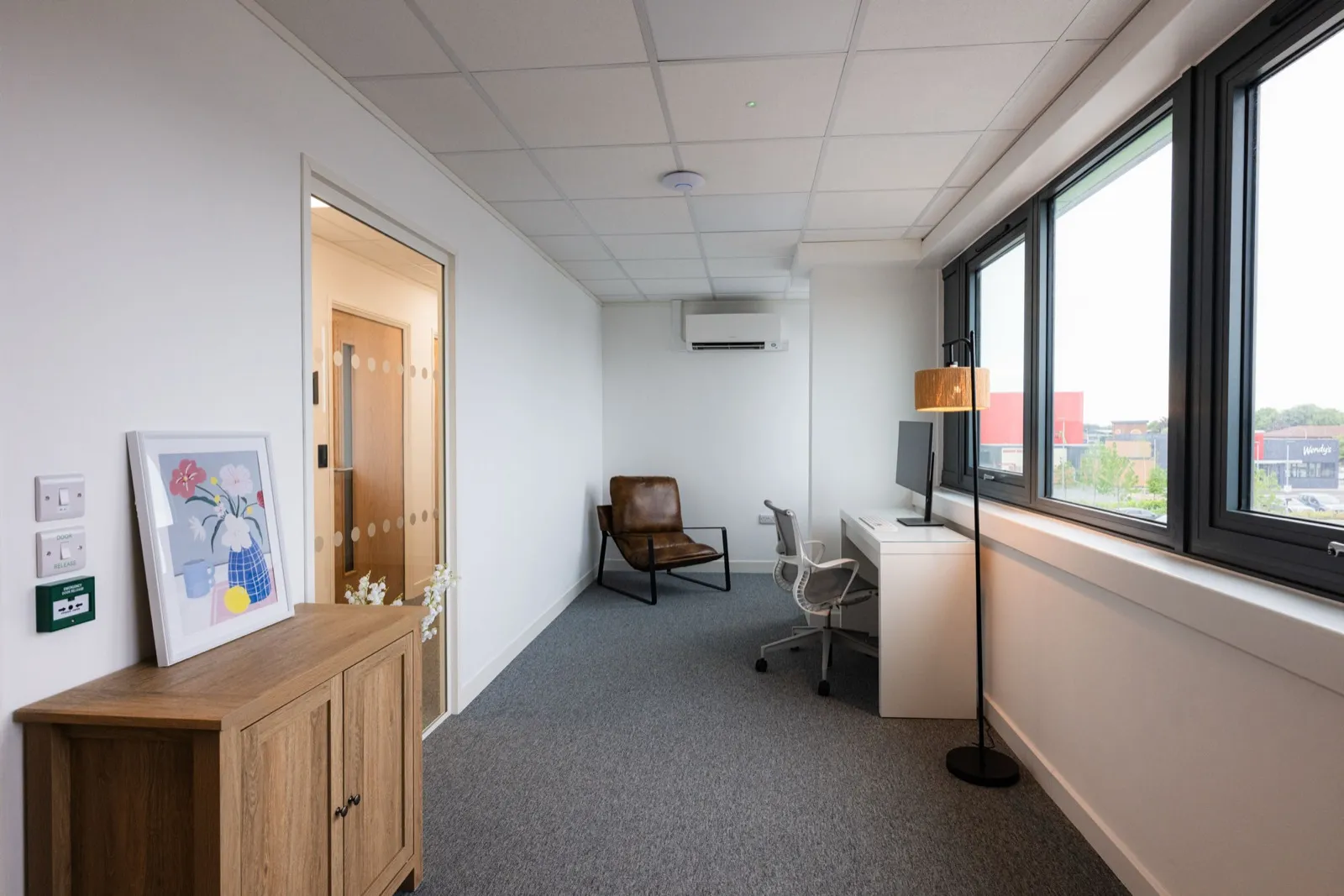 Furnished private office with desk, natural light and city view at Native Space, Peterborough